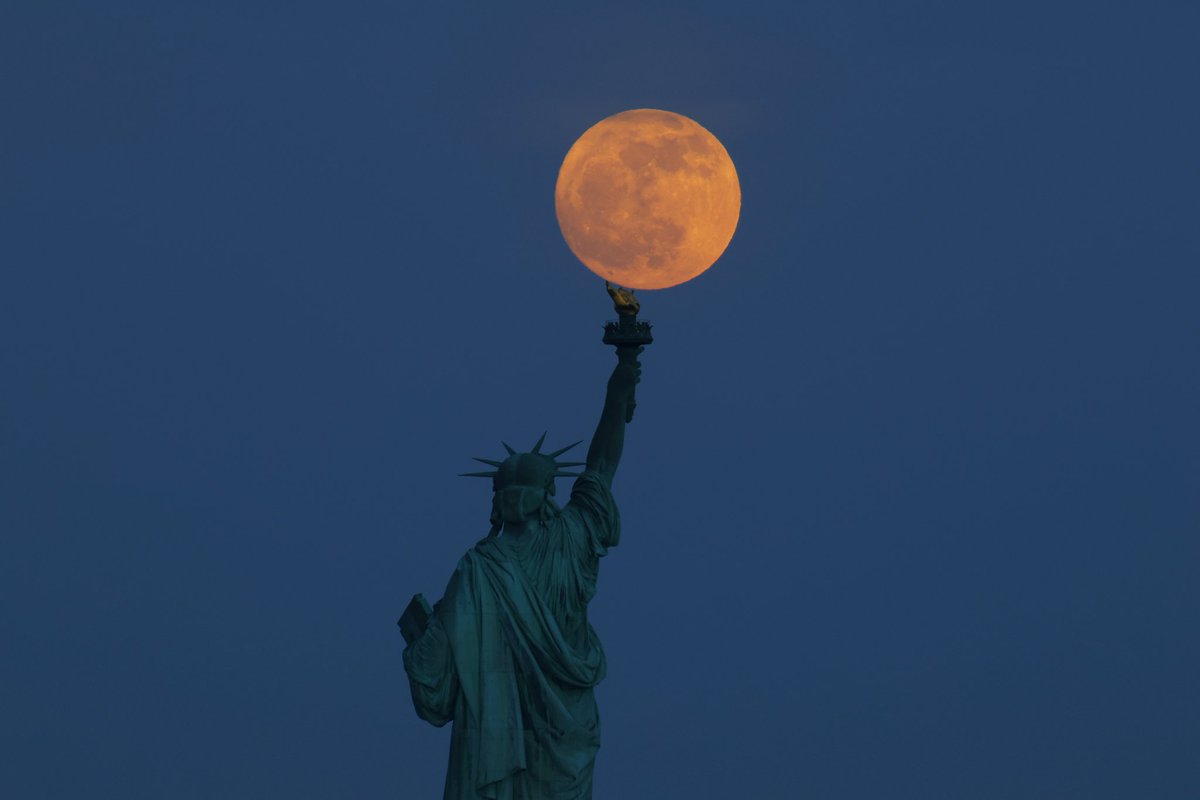 The Flower Moon rises above the Statue of Liberty, Wednesday evening in New York City #newyorkcity #nyc #newyork #statueofliberty #fullmoon #moon #flowermoon