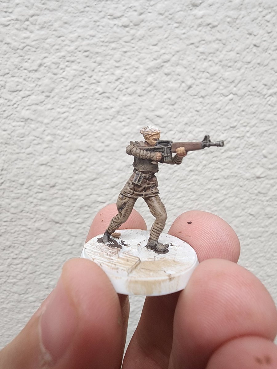 Wip on an NCR Trooper. Was hoping a shade and highlight would tie the colors together but all the browns I used kind of just mixed together? Might have gone a little too hard on the dry brush highlight. Just need to add hair contrast color and do the base.