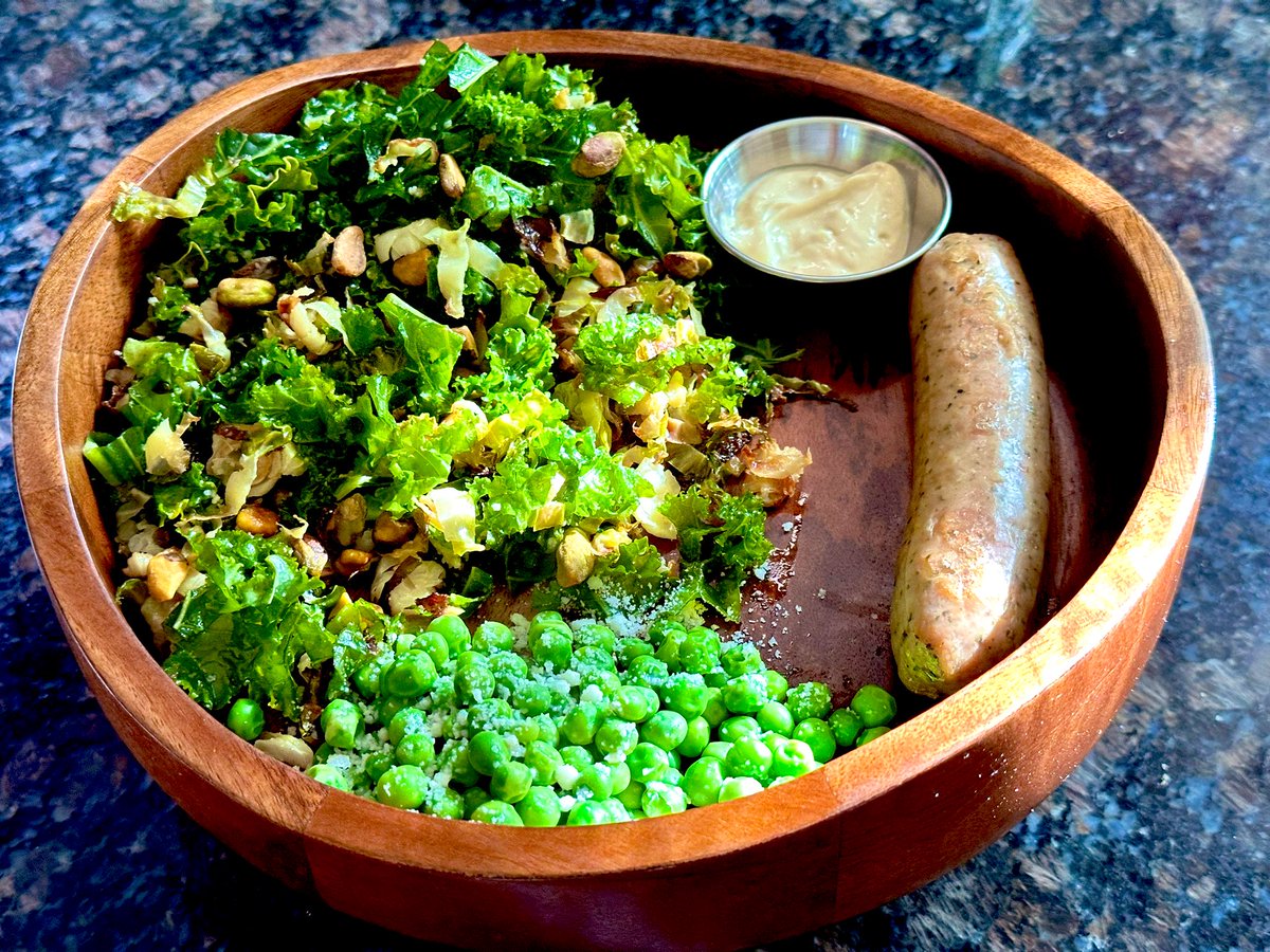 Simple dinner tonight. Kale salad with roasted brussels sprouts and pistachios, peas and a chicken basil sausage with garlic aioli on the side.