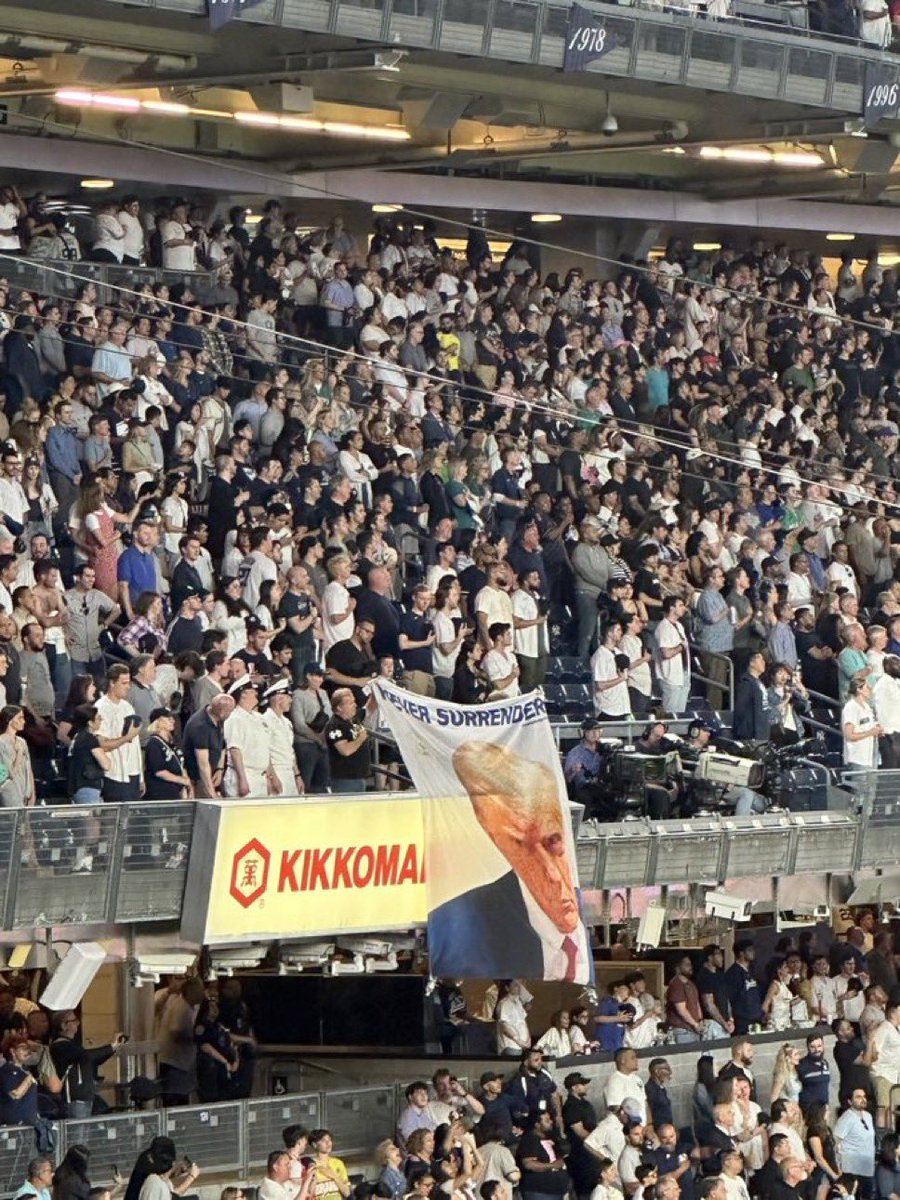 Someone dropped a Trump mugshot banner that says “Never Surrender” at Yankee Stadium 🔥🔥🔥🔥🔥