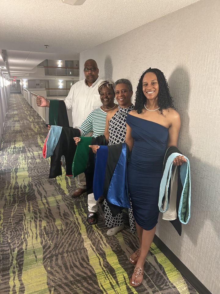 Today my sister was hooded for earning her Ph.D. in plant and soil science. She honors my family’s legacy of higher education by holding my late paternal granddad’s Ph.D. hood and standing with my parents and maternal grandma holding their Ph.D. hoods. I’m so proud of her!