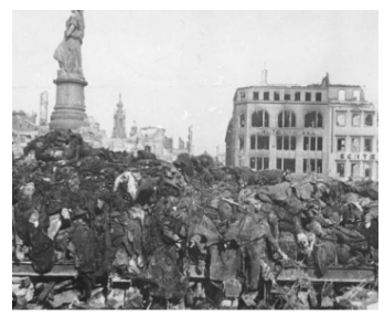 TomatoBubble's tweet photo. A pile of bodies awaits cremation after the bombing of Dresden, 1945, in which no fewer than 200,000 German civilians were burned and suffocated alive by Jewish-instigated US / UK firebombing. https://t.co/Lm0gZHEkdr