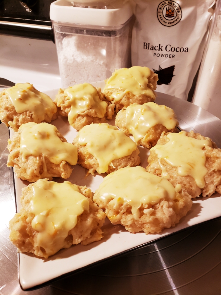 Fluffy Floofball Pineapple Cookies~ Zesty treats filled with citrus delights of lemon and pineapple float along, being buoyed by a thick coating of sweet orange glaze.