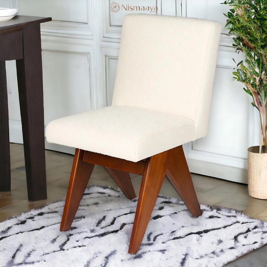 Introducing the Maren dining chair, featuring a beautiful boucle creme upholstery and a warm brown teak wood frame. 

Visit
nismaayadecor.in/collections/ch…

#diningchair #bouclediningchair #teakwoodfurniture #diningchairdesign #nismaayadecor