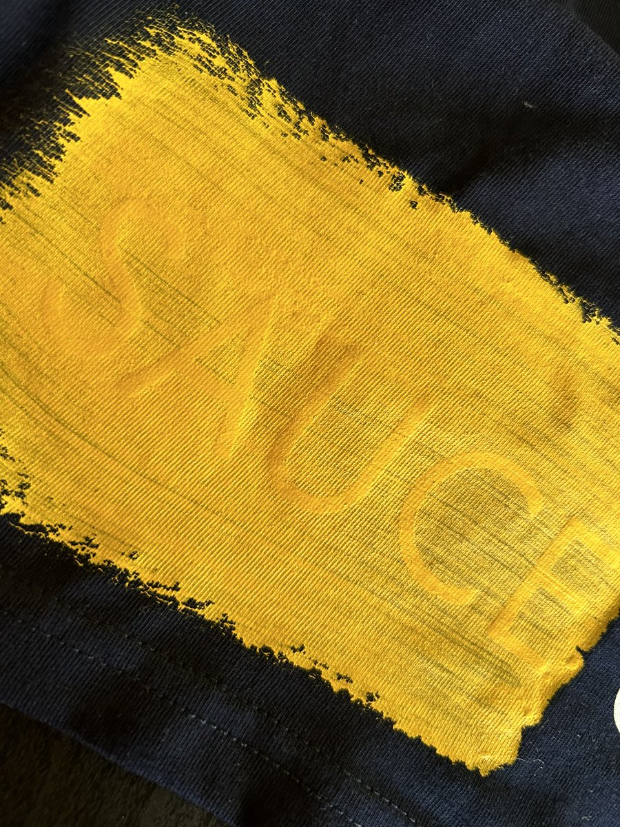 Lined out close up. Screen printed the traditional way using water based inks here in the UK, then overlayed with a brushstroke by hand, making each one unique in its own right. Again with water base inks. #yellow #hand #brushstroke #linedout #menswear #unique #OneHundred