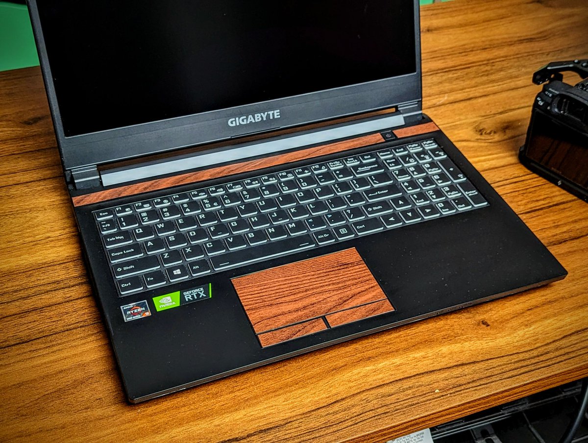 Anyone else blast their laptops with stickers?
Started with just some woodgrain, but got out of hand pretty quickly.