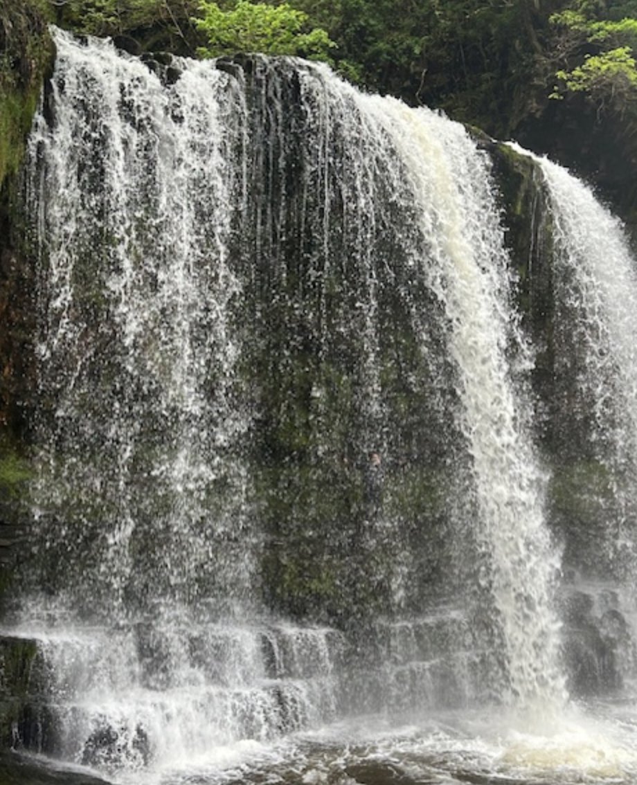 TLPWales's tweet photo. Its not all about #Maths and #Numeracy We took @ban_har for a walk in the Brecon Beacons National Park to see Sgwd Yr Eira Waterfall, making friends in the countryside (the sheep ran off) followed a hearty pub meal! Can you see #BanHar behind the waterfall? https://t.co/8qpwhvXRXV
