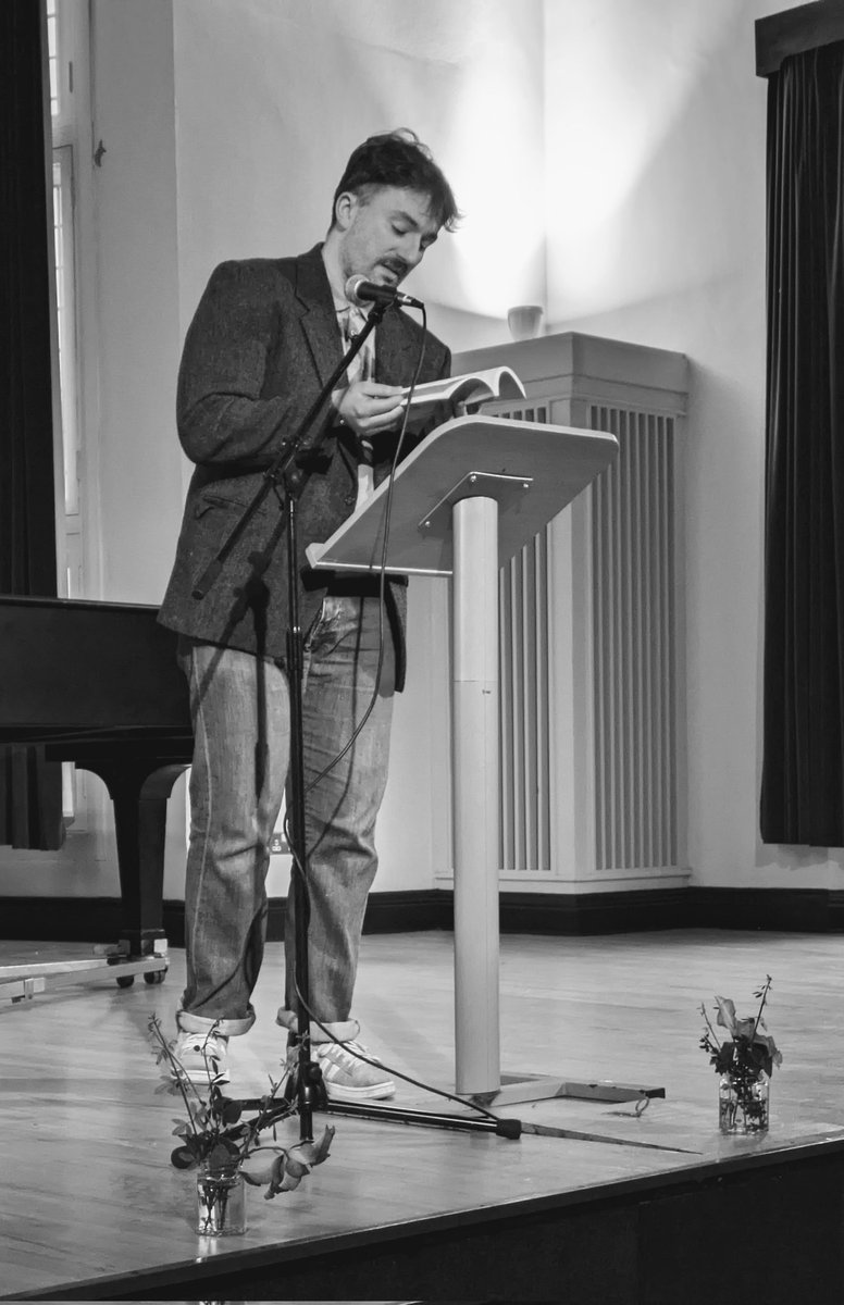2 dots and a close up. My great pleasure to introduce Mícheál McCann at the QUB Belfast launch of 'Devotion', his debut from @TheGalleryPress . It was a concert-sized crowd, testament to how much he is admired.
