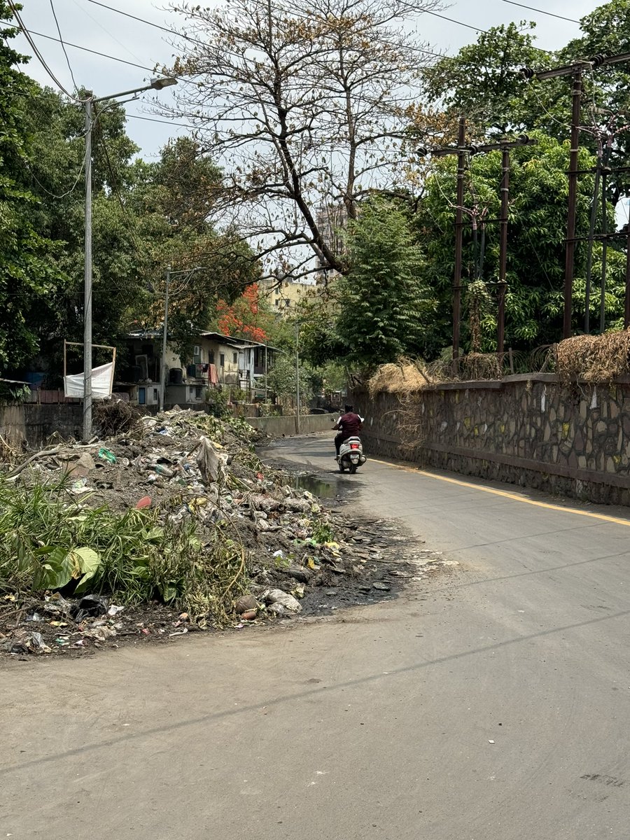 Veeshaljadhav's tweet photo. Why is the Sludge/Waste poured on the road ?
It has become unhyenic &amp; heavy traffic Jam in the evening on this toad which connects to Ballkum.
@TMCaTweetAway can you remove this waste as its taken out as its lying there from 2-3 days now. https://t.co/TU7A35OB0Y