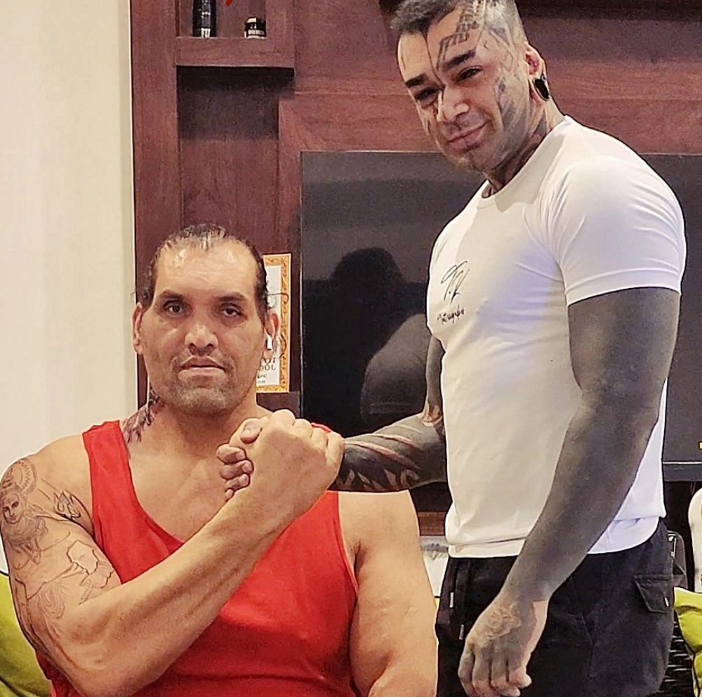 why is no one talking about The Great Khali getting a bunch of tattoos??