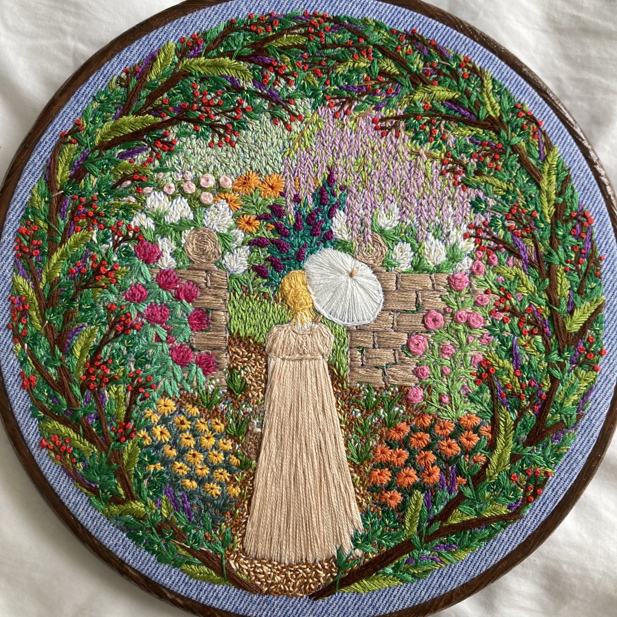 Well here it is and what seems like a million hours of stitching, I give you my latest embroidery… inspired by literature, this one is my take on Jane Austen’s, Emma. 😊🧵🪡🌿📚🌺 *completely freehand stitched without patterns, paint or guides. #stitchedart #thesewingsongbird
