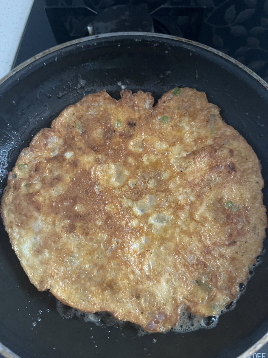 Now, I can flip an omelette just by flicking the handle, without using a spatula. Just like a street food vendor, I need extra ghee to do this. #newskill