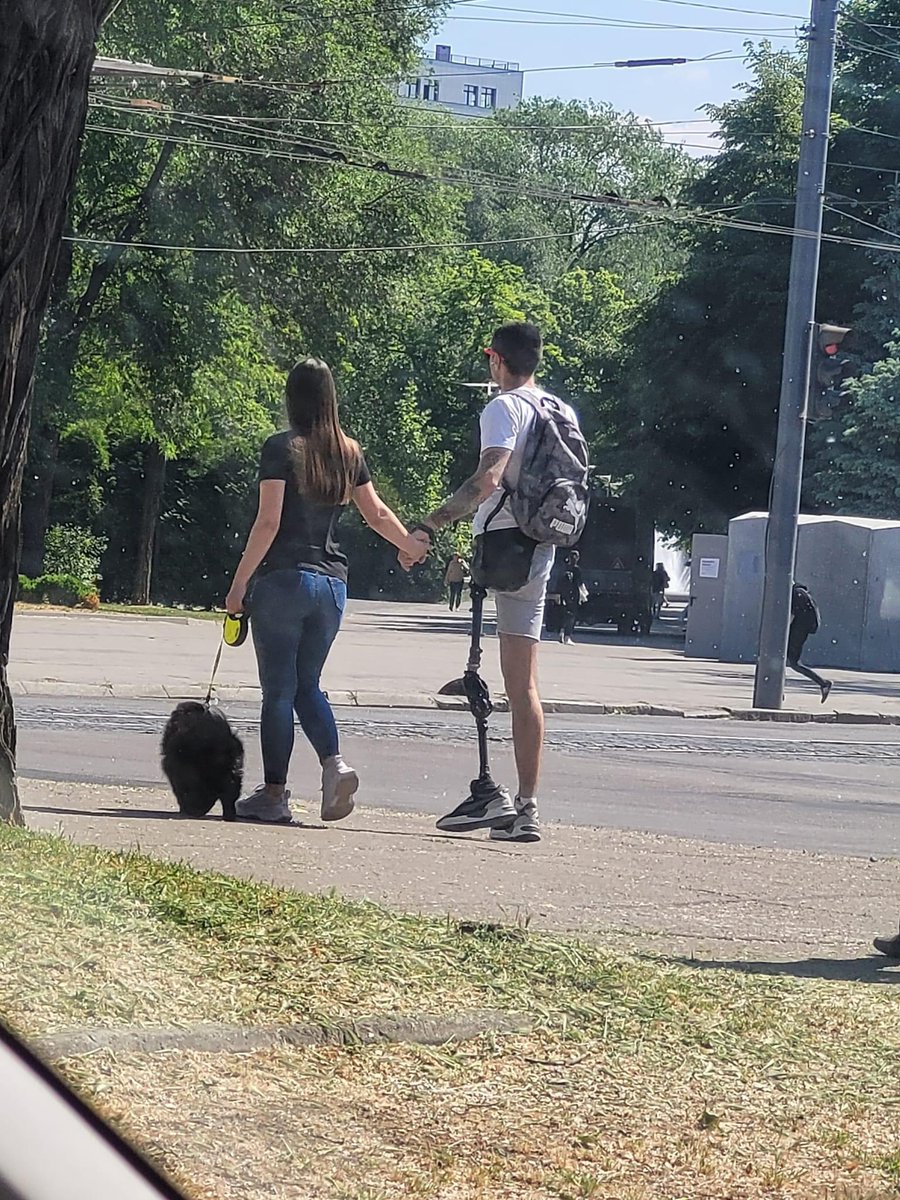 Daryna Sukhonis, journalist from Dnipro, caught this couple walking in the street. This is reality of war and purity of love in Ukraine