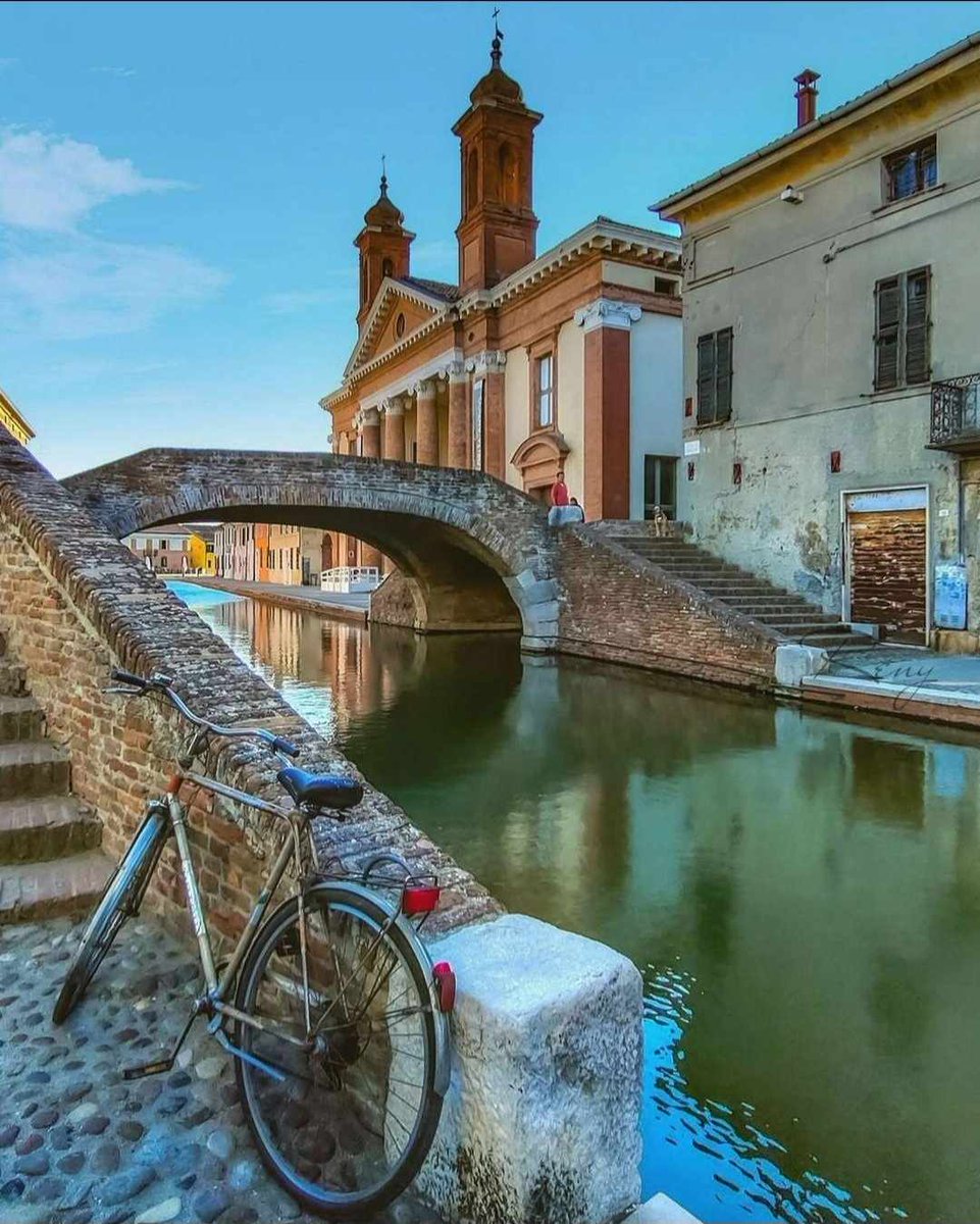 Stopping for a while to contemplate the flow of water, slowly tracing its course under the bridges of #Comacchio Ph. _reny85_ | #inemiliaromagna #italianvillages