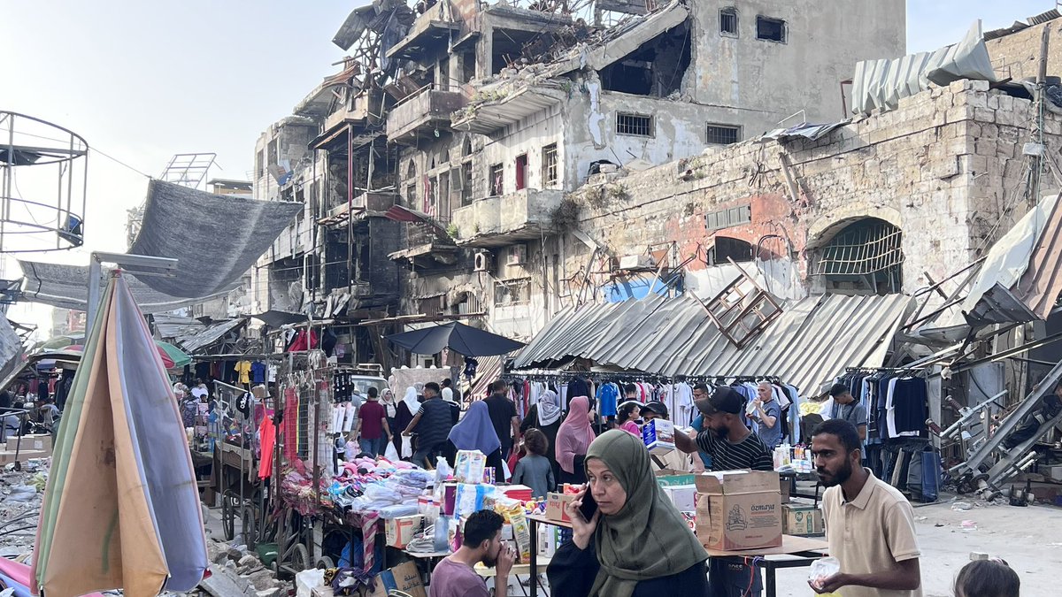 Palestinians love life.. They also can teach life to everyone.. They are not pessimistic at all.. Omar al Mukhtar Street and the largest market in #Gaza.. All of it has been destroyed by Israeli occupation forces, but people ignored the destruction and filled it with life..