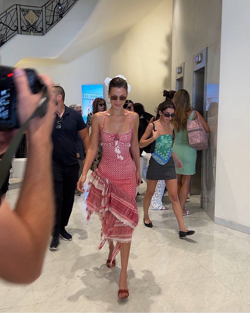 malbwgaf's tweet image. Bella Hadid wearing a Keffiyeh dress in Cannes.
