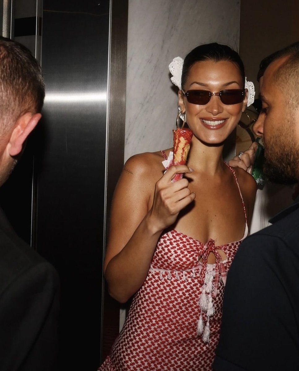 malbwgaf's tweet image. Bella Hadid wearing a Keffiyeh dress in Cannes.