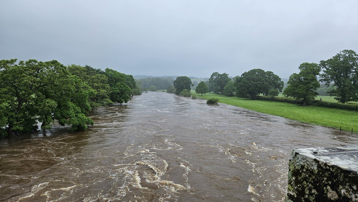 SettleCarlisle's tweet photo. The #rivereden has burst its banks at #Lazonby this morning. Currently no trains along the @SettleCarlisle @foscl line https://t.co/qR2EF897qM