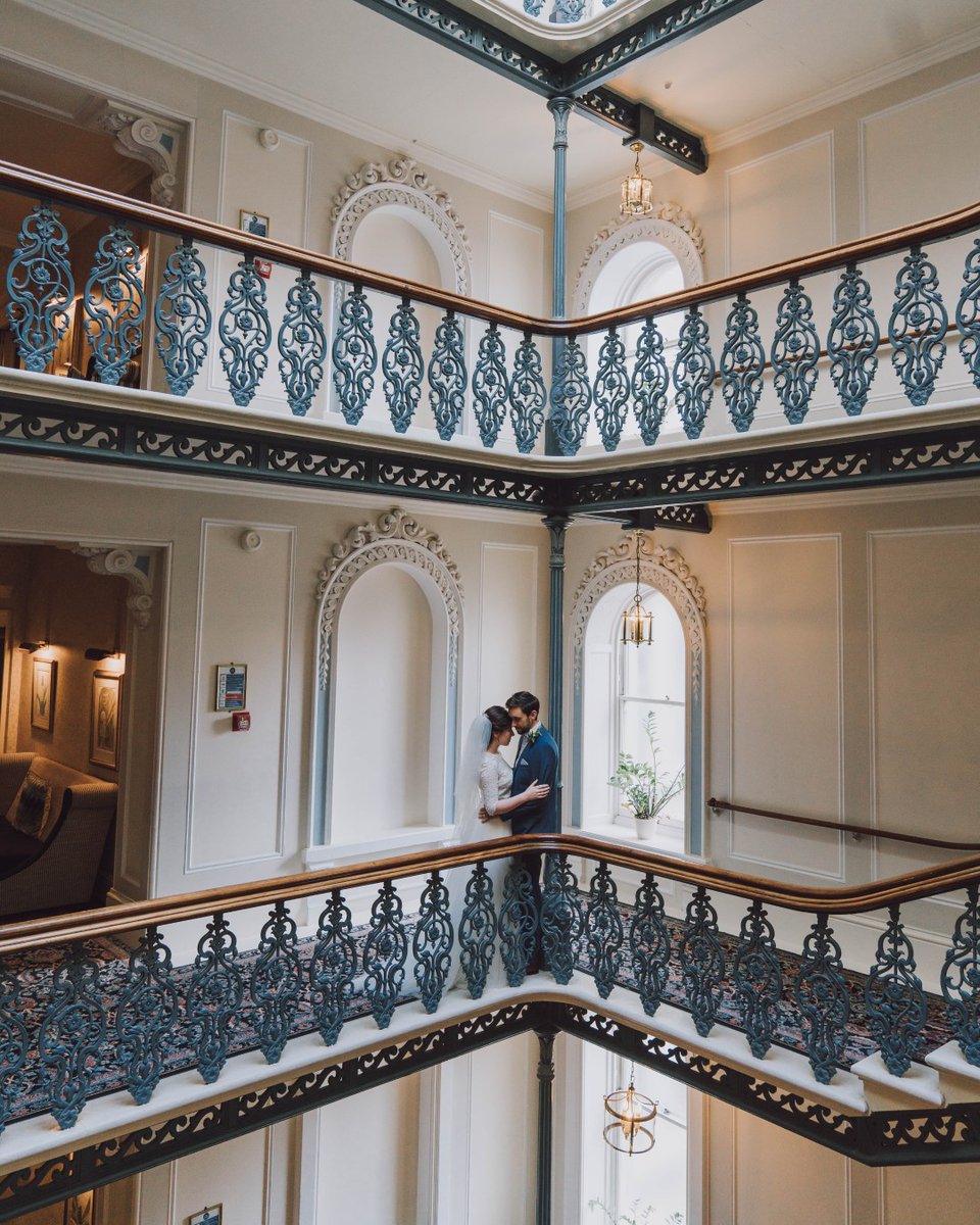 An unforgettable "I do", capturing memories on our ornate Victorian stairways.