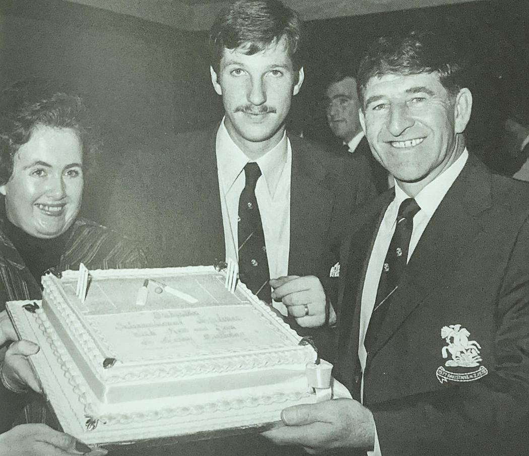 November 1977 and a very young @BeefyBotham looks on as Kenny Barrington receives a cake to celebrate his 47th birthday - the cake was provided by the national airline of the country that Sir Beefy wouldn't send his mother in law to