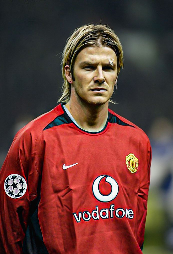 David Beckham lines up for United with a plaster above his eye following reports that Ferguson had kicked a boot at him during a dressing room argument, following defeat against Arsenal at Old Trafford. February 2003.