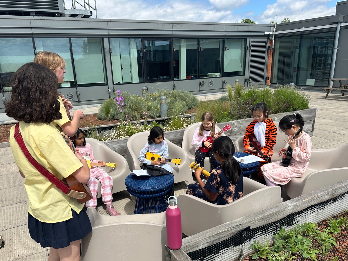 During our Junior School pupil-initiated pyjama day, Year 4 ukulele players enjoy a rooftop lesson with their Year 9 teachers. #openingdoors #mehrlicht