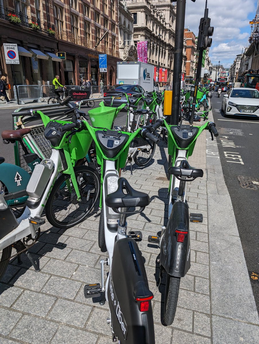 grahamp81's tweet photo. @limebike any chance you can sort out the bikes on Piccadilly so people can actually use the centre refuge? https://t.co/6dT5BfoRrU