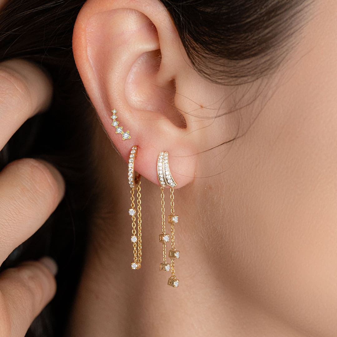 Elevate your ear game with our luxurious drop earrings and delicate ear climbers. Perfectly crafted to add a touch of sparkle and sophistication to any outfit. ✨💛 #LuxuryJewelry #DropEarrings #EarClimbers #SparkleAndShine #SophisticatedStyle #ASHI