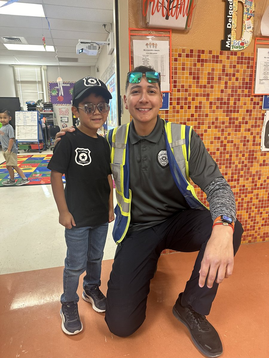 Dressing up as our favorite staff members. Today at the @DSShook_ES ranch we are seeing double with @Jnunez_24 and Officer Lara #TeamSISD #RelentlessRattlers 🧡🐍💙