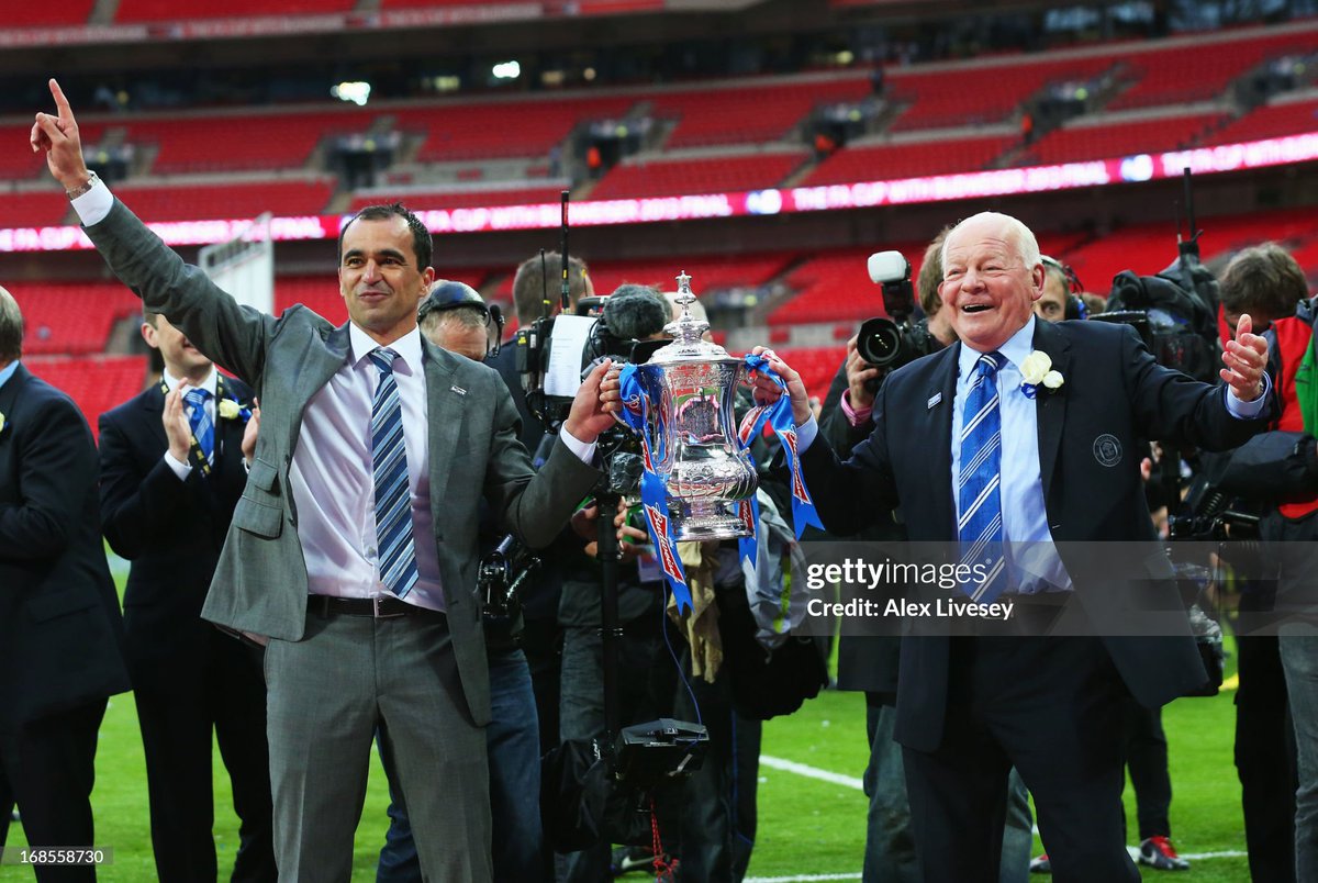 Manager Roberto Martinez of Wigan Athletic and Wigan chairman Dave Whelan celebrate with the trophy following his team's 1-0 victory during the FA Cup with Budweiser Final between Manchester City and Wigan Athletic at Wembley Stadium (2013)