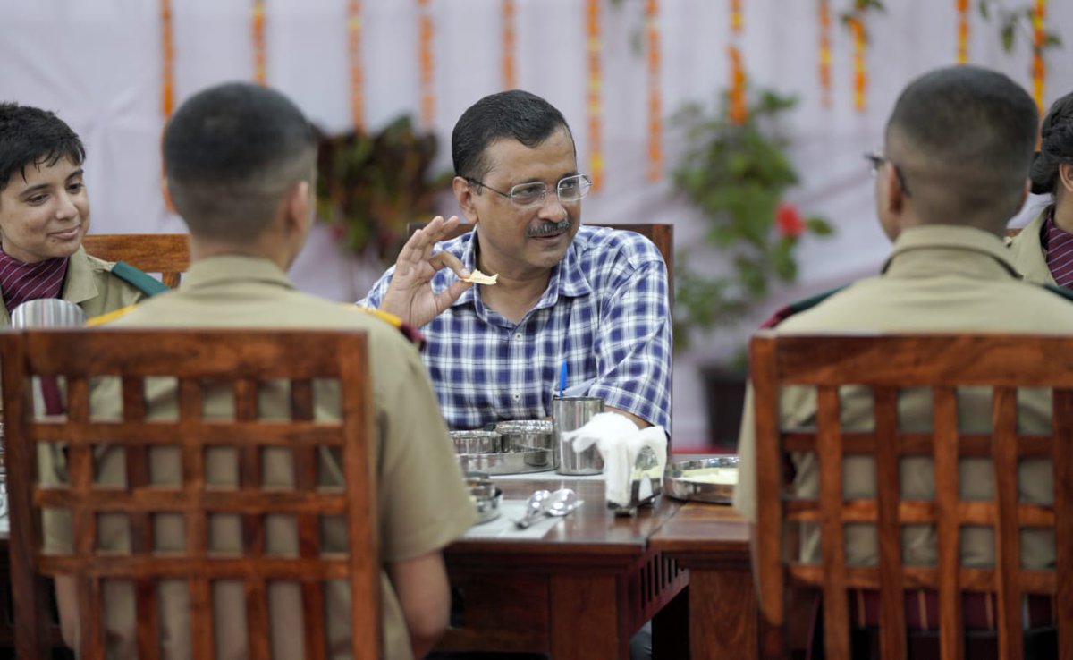 Chief Minister Arvind Kejriwal Having Lunch with Students of the Delhi Govt's Army Force Preparatory School. There's marble flooring, teakwood dining tables & silverware in a Govt School. He wasn't Joking when he said there would be World-Class Govt Schools with No Compromise.