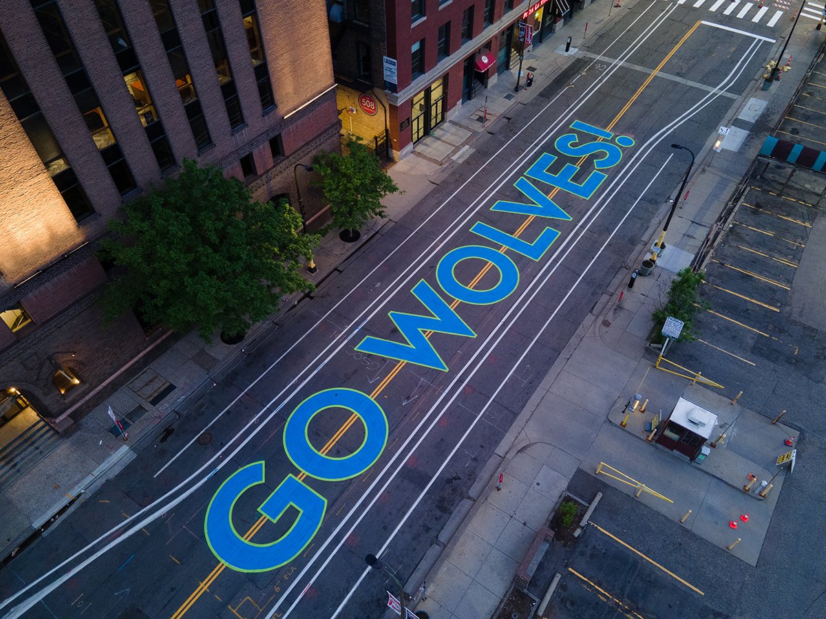 CityMinneapolis's tweet photo. In honor of the Minnesota Timberwolves making it into the Western Conference Finals for the first time in 20 years, we’re celebrating by painting First Avenue downtown and temporarily changing street signs to honor the Wolves. https://t.co/G7Jb1DnF5q https://t.co/u8biMGBpOf