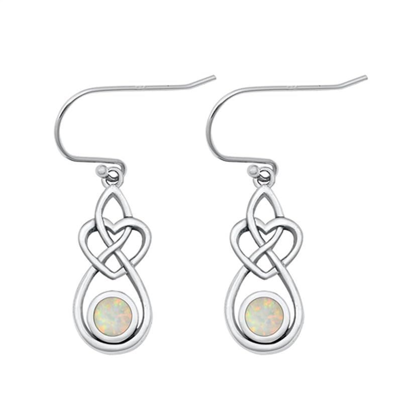 Available in blue and white opal. buff.ly/3K2mKfa 

#luxsalvejewelry #heartknot #dangleearrings #celticinspired #silverearrings