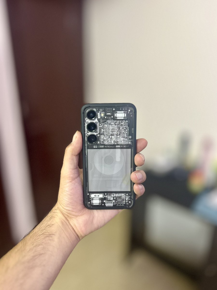 S23 with X-Ray (Dark) skin by <a href="/dbrand/">dbrand</a> x <a href="/ZacksJerryRig/">JerryRigEverything</a> paired with <a href="/SpigenWorld/">spigenworld</a>’s Hybrid Case to give it a modded phone look.