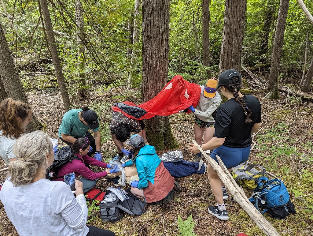Team of docs, nurses and pre- hospital care providers arriving at a "patient" at The CARE Course goes WILDE! and setting up shelter <a href="/RCC_bc/">Rural Coordination Centre of BC (RCCbc)</a> <a href="/CAEP_Docs/">CAEP</a> <a href="/DoctorsOfBC/">Doctors of BC</a> <a href="/TheResusRoom/">TheResusRoom</a> <a href="/stemlyns/">Saint Emlyn's</a> <a href="/AlbertaRhPAP/">Rural Health Professions Action Plan (RhPAP)</a>
