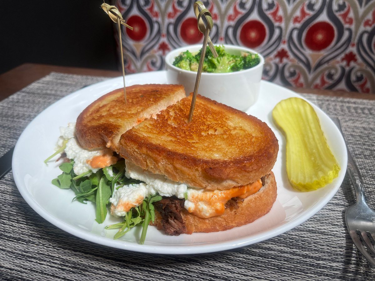 Experience our mouthwatering Short Rib Grilled Cheese! Loaded with savory short rib, pickled red onions, tangy dijon smoked aioli, and creamy ricotta cheese, all sandwiched between crispy rustic panini bread. 

#GrilledCheese #ComfortFood #Foodie #FoodLove #DeliciousEats