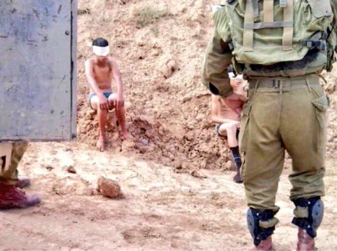 Zionist pedophiles strip down child hostages. What happened to them is still unknown.