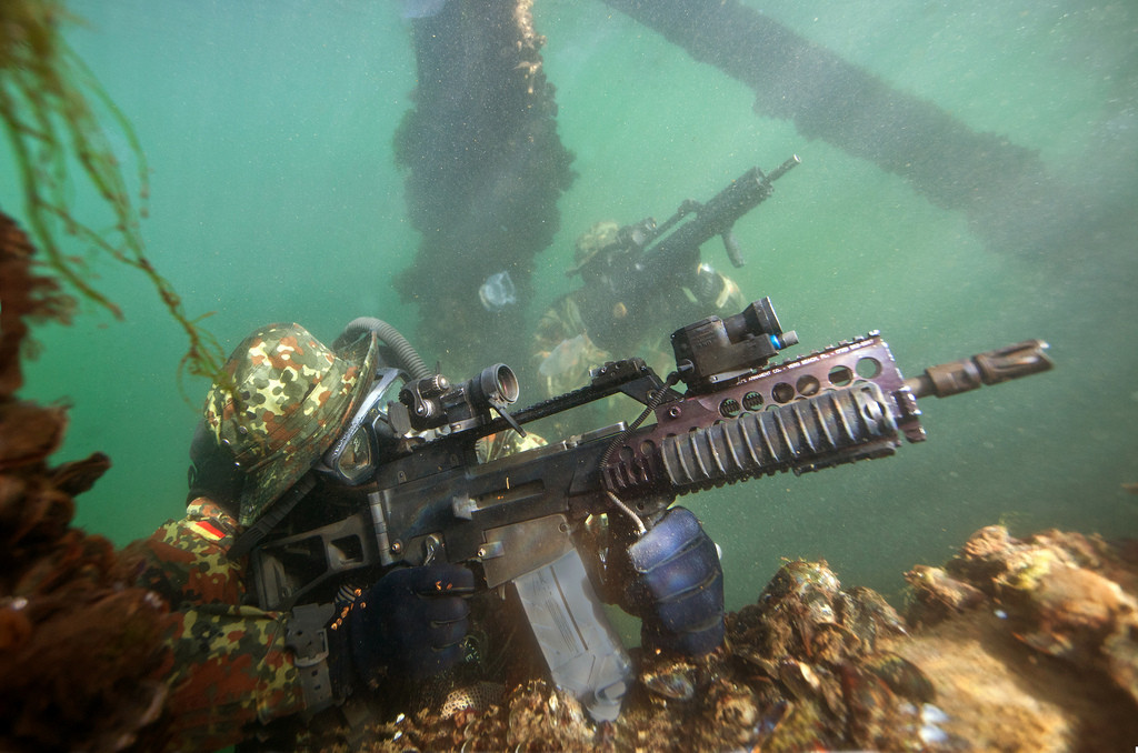 German Kampfschwimmers taking their G36s for a dip.