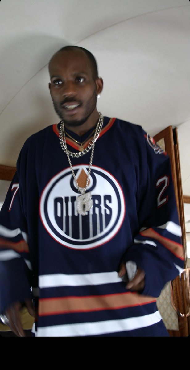 Mans is on zoom in a hockey jersey looking just like this