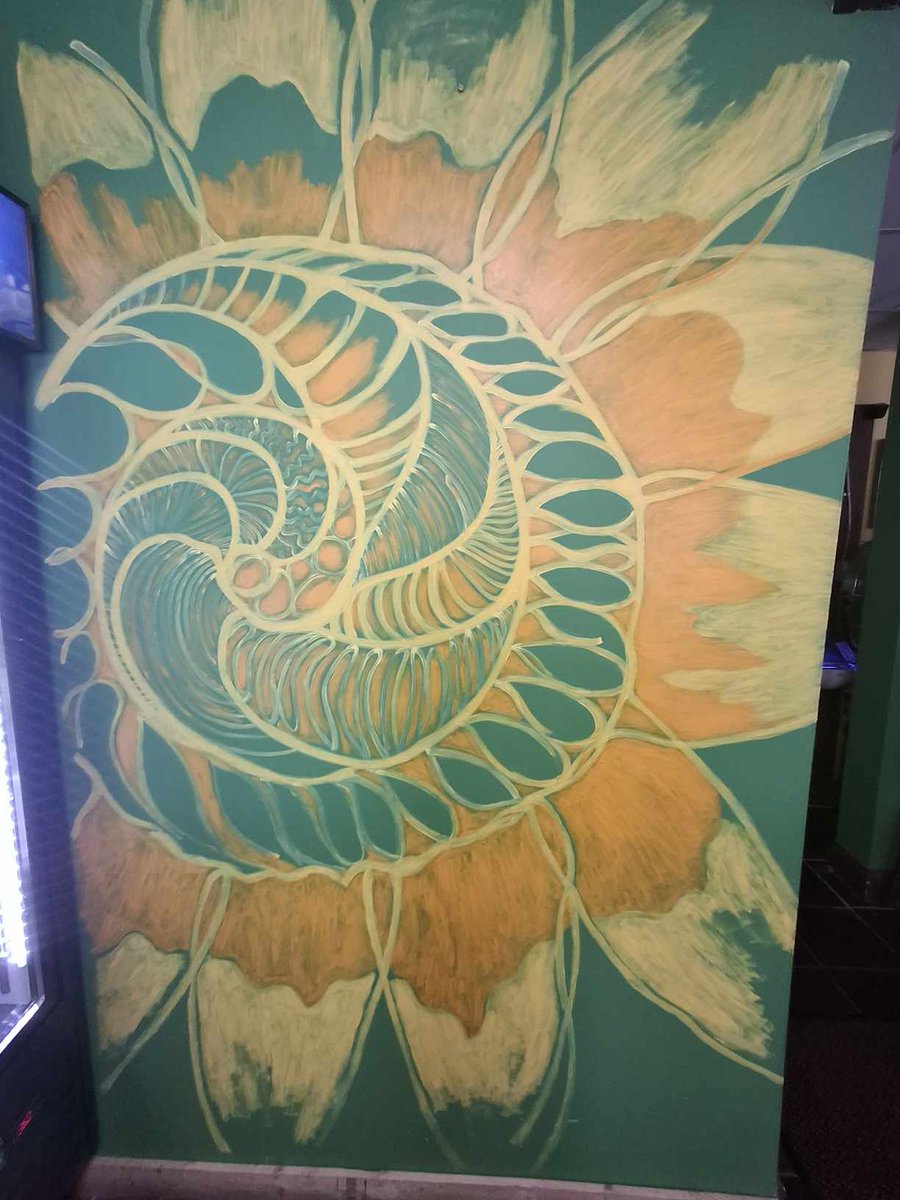 kedss46's tweet photo. My latest sunflower painting at Mr. Bumbles Cafe, Albany, NY, WIP (hopefully will be completed by Pride Month) https://t.co/845QaN2Ztr