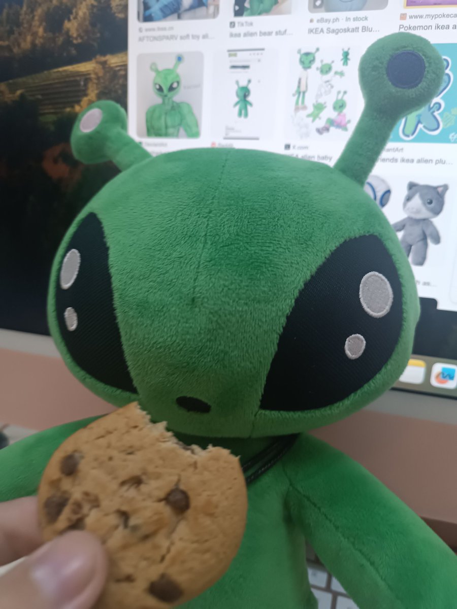 Feeding him a cookie