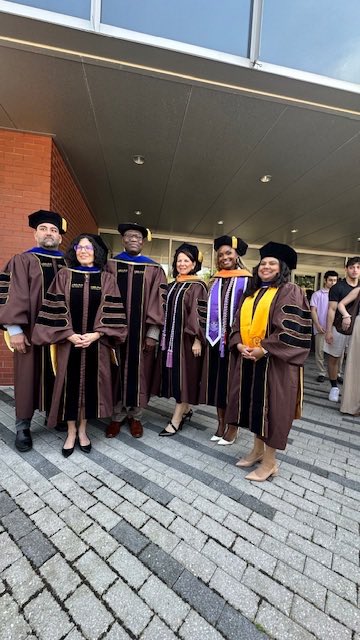 DonohuePorter's tweet photo. Congratulations from @AdelphiCNPH to our 6 PhD graduates together at Doctoral Hooding! L-R Jonas Scholar Dr. Joseph Amnawah, Dr. Teresa Bertozzi-Greco, Dr. Afolabi Poroye, Dr. Dena Alberti, Dr. Charleen Jacobs-McFarlane, Dr. Dimple Puthethukudi George!!!!!! https://t.co/kFKpDlTiXe