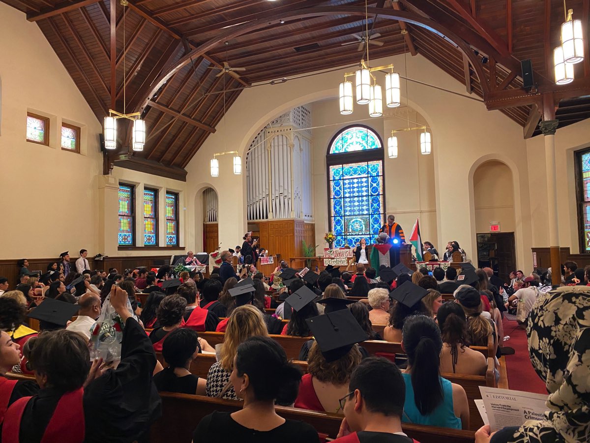 MaxKrupnick's tweet photo. Hundreds of #Harvard graduates walked out of this morning’s commencement to protest Israel’s war in Gaza and the university’s decision to bar 13 seniors from graduating due to the encampment. I spoke with student protesters at “The People’s Commencement.” https://t.co/rbS0IcI08V https://t.co/ChLUPK2KgZ