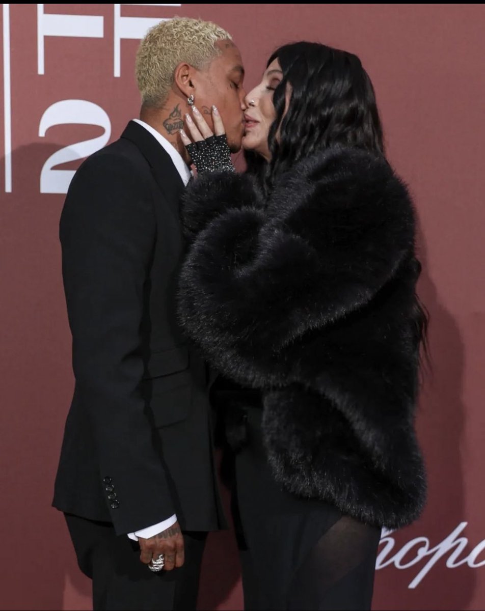 NikNik_Nichole's tweet photo. So, we’re doing PDA now?! ☺️ #cher &amp; #AlexanderEdwards at the #amfar event in Cannes. Pics via @TCherUniverse IG https://t.co/9agp9Ontw5