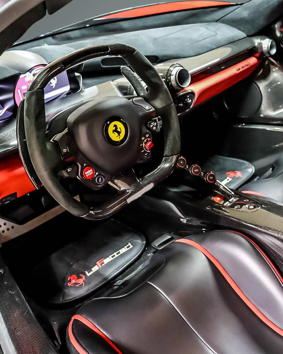 2014 Ferrari LaFerrari | Asking Price: $3,999,888

This LaF is beautifully spec'd in Rosso Fuoco over a Pelle Nera Dettagli Rossi interior 😍