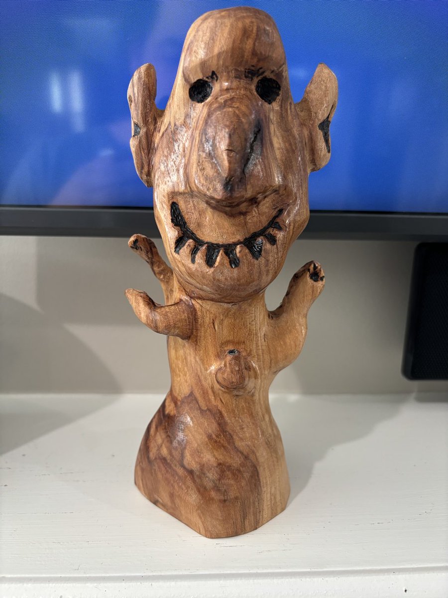 My first creation is a Clay Dabbler figurine carved out of wood.