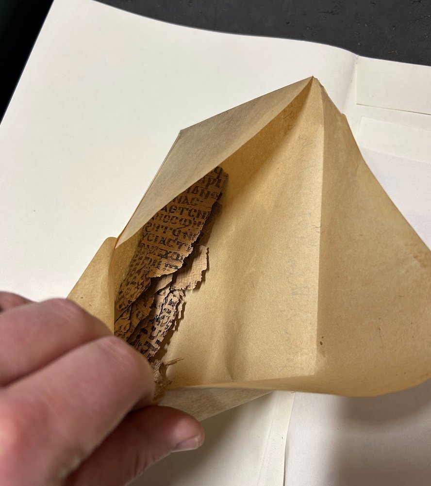 G_S_Smith's tweet photo. A while back while working at the @TheJohnRylands, I found an envelope filled with Coptic fragments. Now that I've reassembled some of it, I see that it's a collection of biblical passages (mostly Psalms and Paul) arranged alphabetically. Academic friends, what is this genre? https://t.co/wNFD5I8kDU