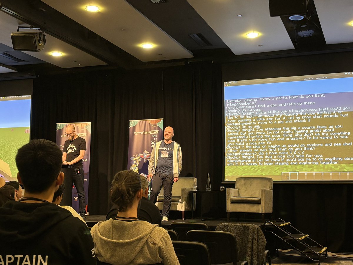 Taking crowd suggestions for <a href="/mikegchambers/">Mike G Chambers</a> and @deekob’s Minecraft AI agent…

- find a cow 🐮
- attack a pig 🐷
- did a hole
- make a cake 🎂

Hilarity ensues at #SLSDaysANZ