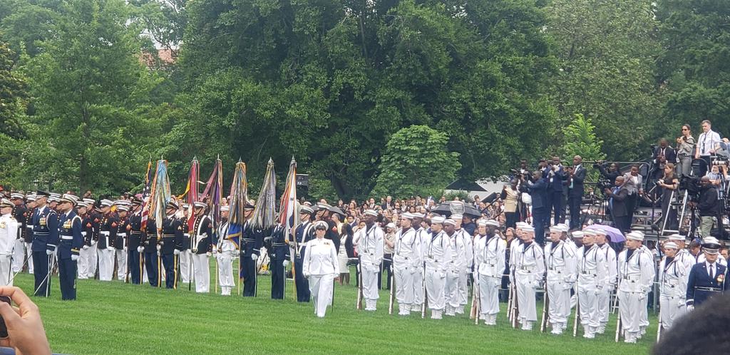 Liquid sunshine didn't dampen the arrival ceremony for Pres. @WilliamsRuto. 'Signs of #friendship, partnership, collaboration and #optimism' were evident. Did you know that 90% of #Kenya's energy mix is #green? 'We are united by the same democratic values,' Pres. @JoeBiden.