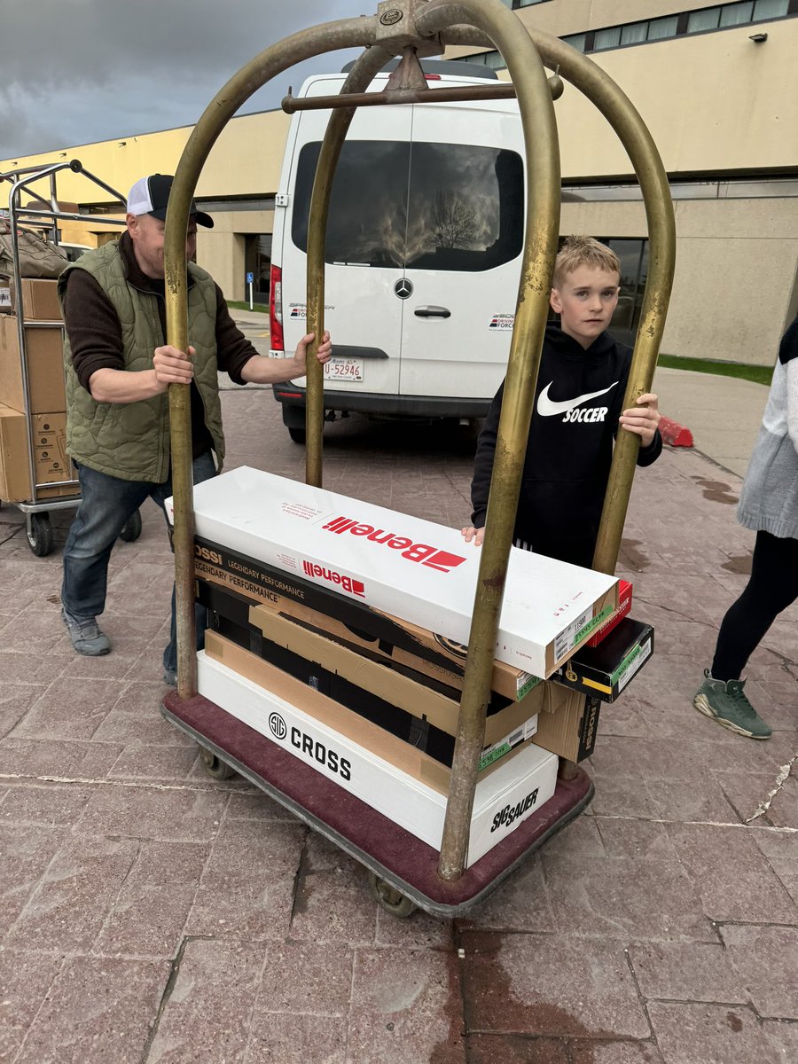 My grandson rolling into the hotel lobby with @CCFR_CCDAF President @ScottRCarpenter and a trolly fulla guns 🇨🇦🤷🏼‍♀️❤️🏔️ #CCFRAGM 

ccfr.hibid.com